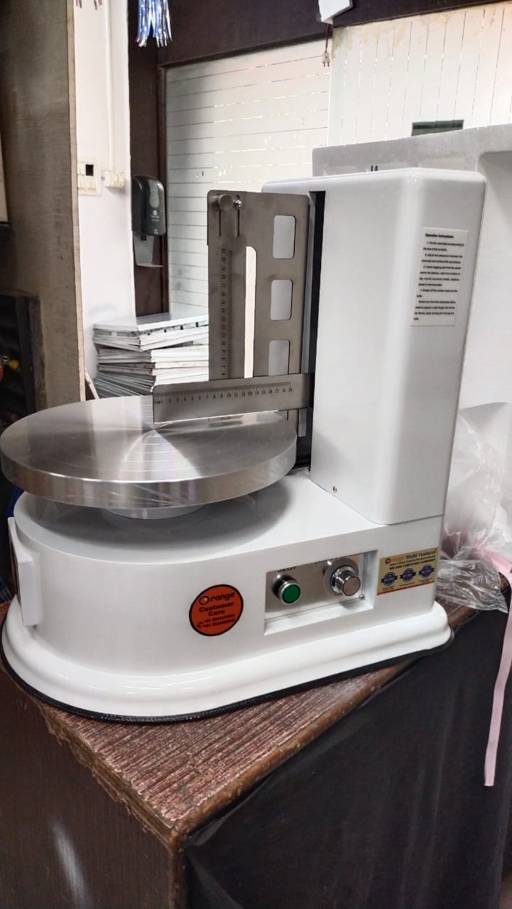 cake icing machine.j